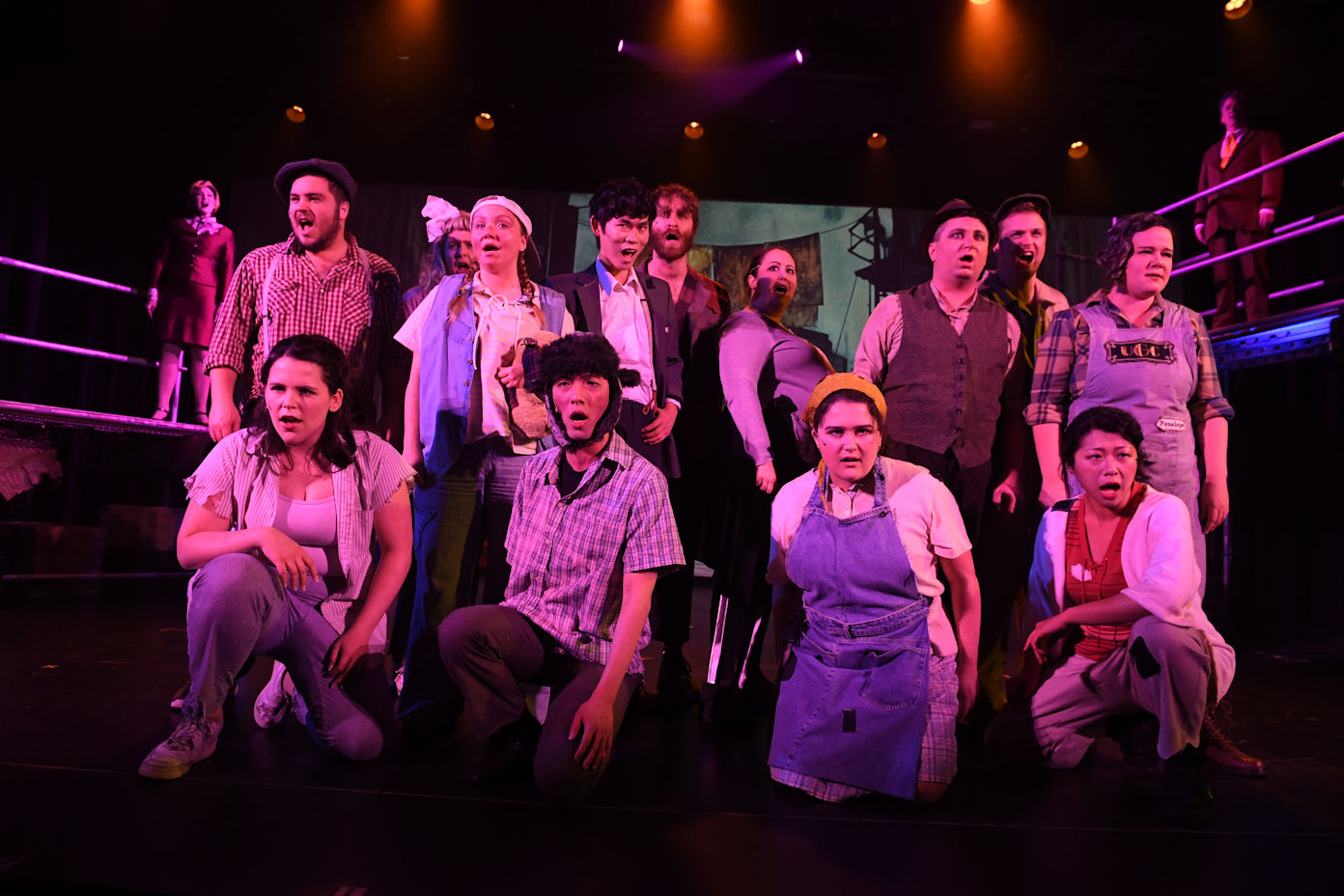 a couple picks heather on a hill